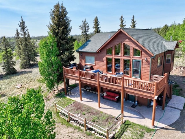 56 Apache Trl, Como, CO 80432 - rear view of property featuring a patio, a deck, and roof with shingles