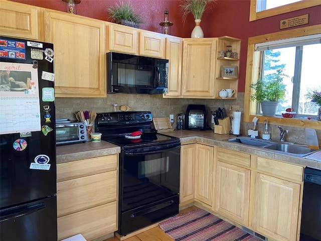 56 Apache Trl, Como, CO 80432 - kitchen with black appliances, light brown cabinetry, backsplash, and open shelves
