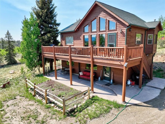 56 Apache Trl, Como, CO 80432 - rear view of property with a patio and a deck