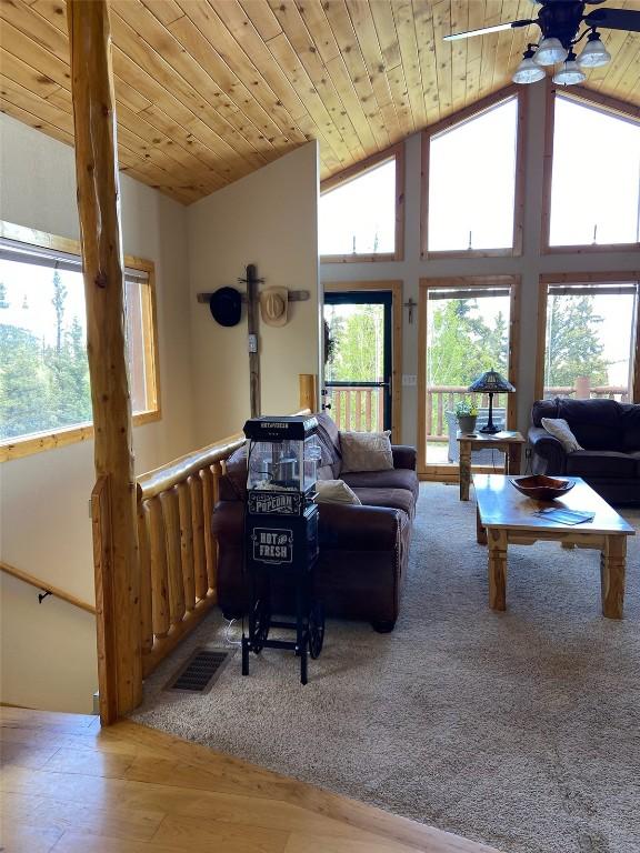 56 Apache Trl, Como, CO 80432 - living area with ceiling fan, wood ceiling, wood finished floors, and high vaulted ceiling