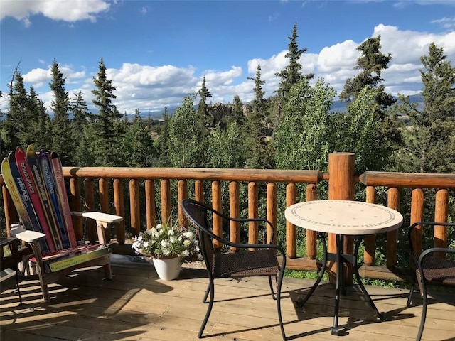 56 Apache Trl, Como, CO 80432 - view of wooden balcony featuring a wooden deck