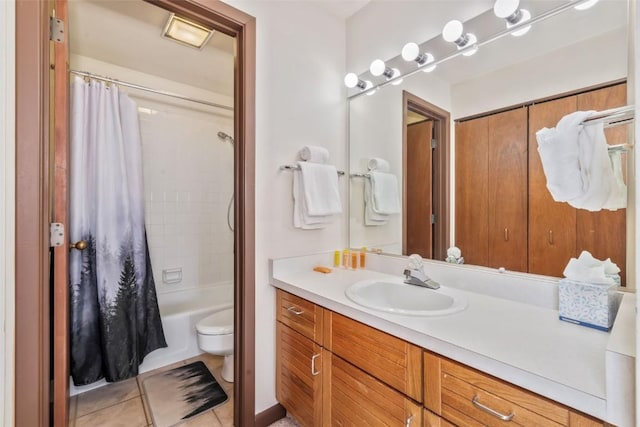 2015 Walton Creek Rd Unit 114, Steamboat Springs, CO 80487 - bathroom featuring tile patterned floors, vanity, toilet, and shower / tub combo