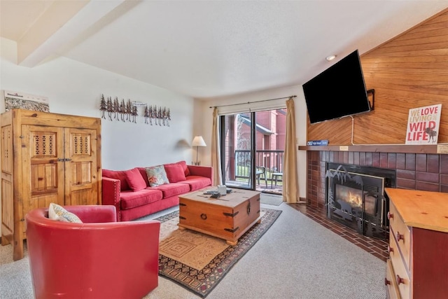 2015 Walton Creek Rd Unit 114, Steamboat Springs, CO 80487 - carpeted living room with a fireplace