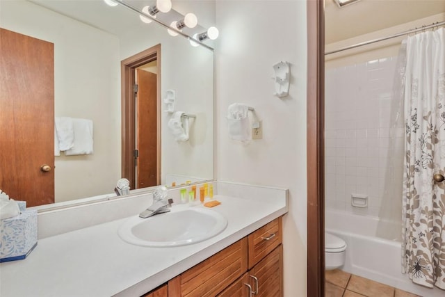 2015 Walton Creek Rd Unit 114, Steamboat Springs, CO 80487 - full bathroom with toilet, tile patterned floors, shower / bath combo, and vanity