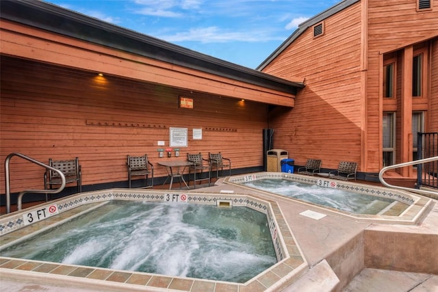 2015 Walton Creek Rd Unit 114, Steamboat Springs, CO 80487 - view of pool featuring an in ground hot tub