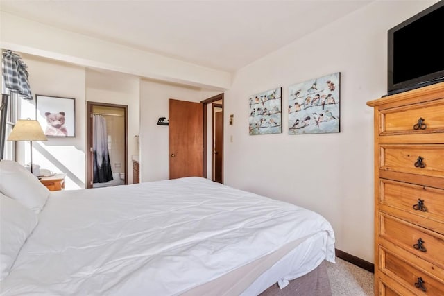 2015 Walton Creek Rd Unit 114, Steamboat Springs, CO 80487 - bedroom with baseboards and carpet