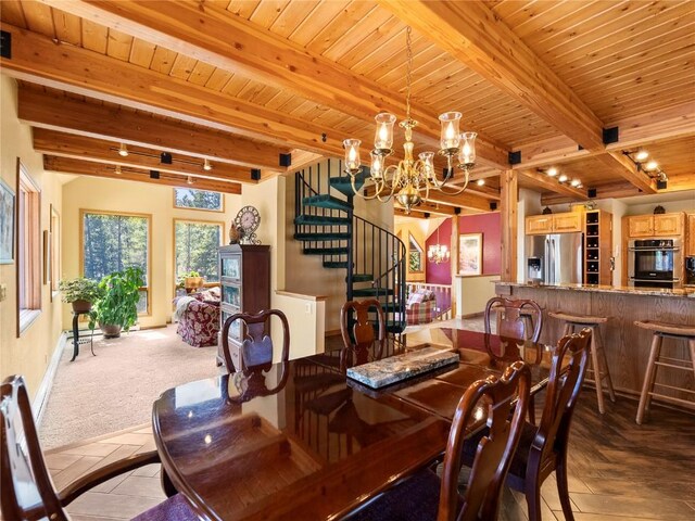 463 Blue Flag Cir, Breckenridge, CO 80424 - dining area featuring a chandelier, stairway, wooden ceiling with exposed beams, baseboards, and carpet floors