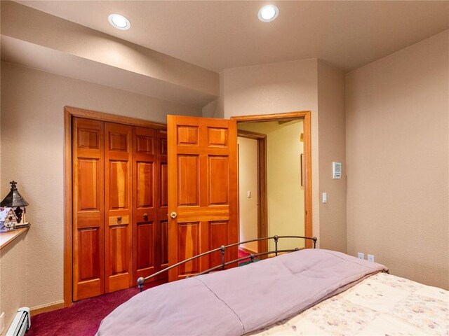 463 Blue Flag Cir, Breckenridge, CO 80424 - bedroom featuring baseboard heating, dark colored carpet, a closet, recessed lighting, and baseboards