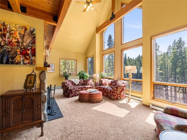 463 Blue Flag Cir, Breckenridge, CO 80424 - carpeted living area with high vaulted ceiling, baseboards, baseboard heating, ceiling fan, and a baseboard radiator