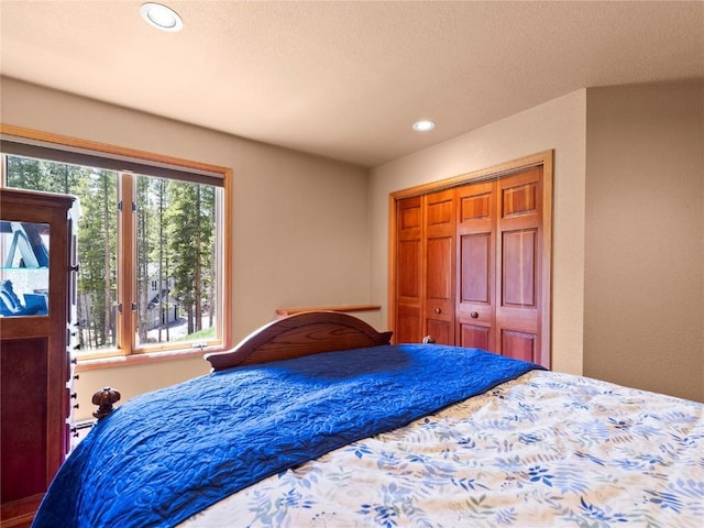 463 Blue Flag Cir, Breckenridge, CO 80424 - bedroom with recessed lighting, a closet, and a baseboard heating unit