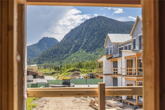 property view of mountains featuring a view of trees