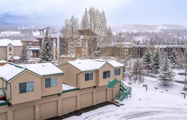 980 Lakepoint Dr Unit 404, Frisco, CO 80443 - snowy aerial view featuring a residential view