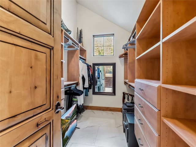 59 Mountain Bluebell Rd, Keystone, CO 80435 - spacious closet featuring light marble finish floors and lofted ceiling