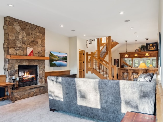 59 Mountain Bluebell Rd, Keystone, CO 80435 - living area with carpet floors, a fireplace, stairs, and recessed lighting