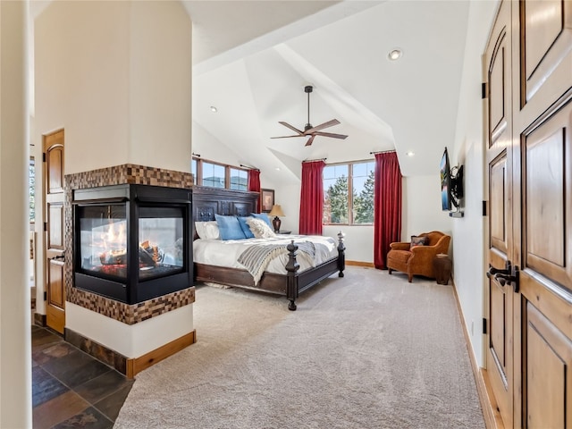 59 Mountain Bluebell Rd, Keystone, CO 80435 - carpeted bedroom featuring baseboards, a ceiling fan, recessed lighting, and a multi sided fireplace