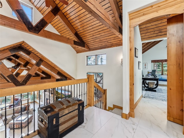 59 Mountain Bluebell Rd, Keystone, CO 80435 - stairs featuring wood ceiling, marble finish flooring, baseboards, and a skylight