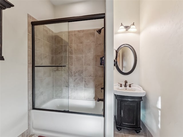 59 Mountain Bluebell Rd, Keystone, CO 80435 - bathroom featuring enclosed tub / shower combo, vanity, and tile patterned flooring