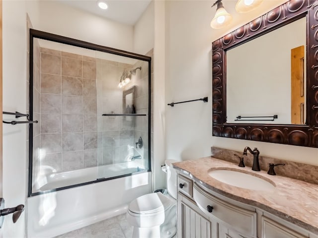 59 Mountain Bluebell Rd, Keystone, CO 80435 - full bathroom featuring vanity, toilet, enclosed tub / shower combo, and tile patterned flooring