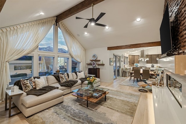 456 Forest Hills Dr, Breckenridge, CO 80424 - living area featuring beam ceiling, light wood finished floors, a ceiling fan, and high vaulted ceiling
