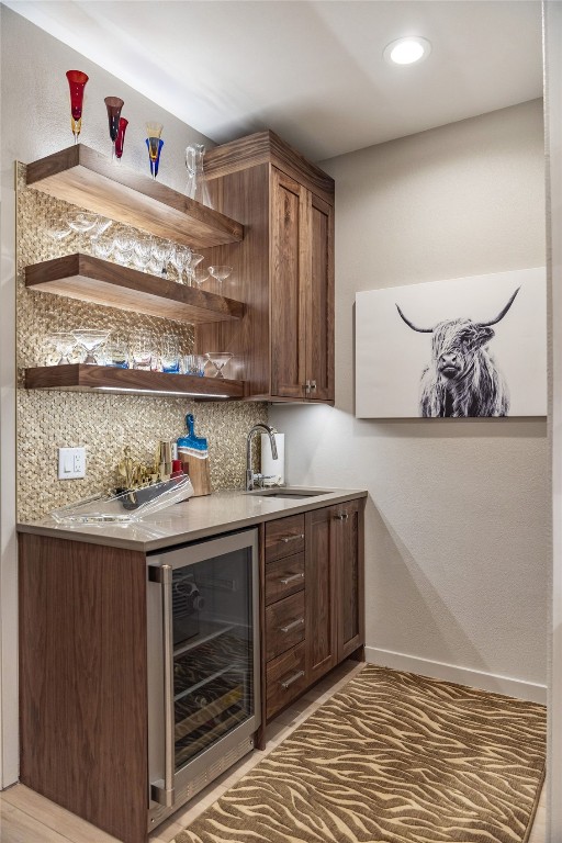 456 Forest Hills Dr, Breckenridge, CO 80424 - indoor wet bar featuring wine cooler, decorative backsplash, and recessed lighting