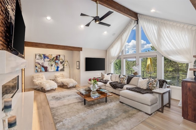 456 Forest Hills Dr, Breckenridge, CO 80424 - living area with a ceiling fan, light wood finished floors, a fireplace, beam ceiling, and recessed lighting