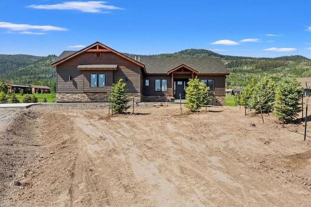 30350 Hostler Dr, Oak Creek, CO 80467 - view of front of property featuring a mountain view and stone siding