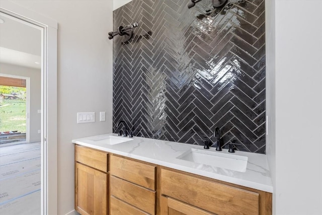 30350 Hostler Dr, Oak Creek, CO 80467 - full bath with tiled shower, backsplash, and double vanity
