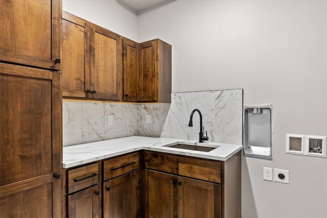 30350 Hostler Dr, Oak Creek, CO 80467 - kitchen with tasteful backsplash and light stone counters