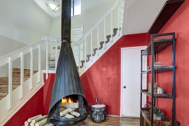 stairway featuring hardwood / wood-style flooring