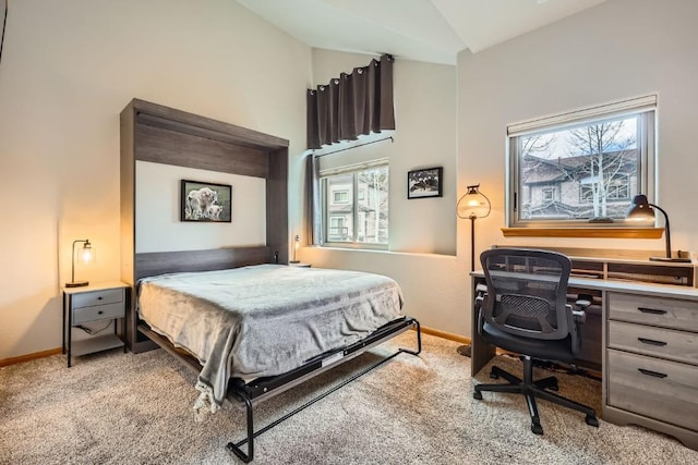 320 Kestrel Ln Unit 320, Silverthorne, CO 80498 - bedroom with vaulted ceiling, carpet flooring, and baseboards