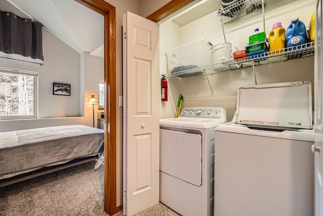 320 Kestrel Ln Unit 320, Silverthorne, CO 80498 - clothes washing area with washer and clothes dryer and carpet flooring