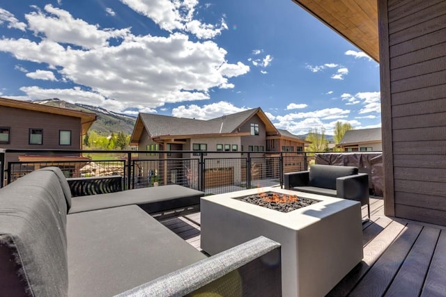 1241 Urban Way, Steamboat Springs, CO 80487 - wooden terrace featuring a fire pit and a residential view