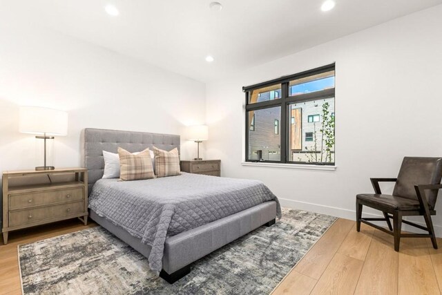1241 Urban Way, Steamboat Springs, CO 80487 - bedroom featuring wood finished floors, recessed lighting, and baseboards