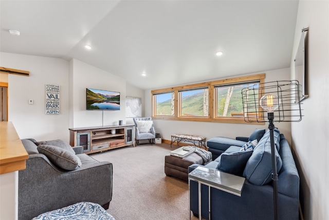 7 Moss Way, Silverthorne, CO 80498 - living area with lofted ceiling, carpet, recessed lighting, and a barn door