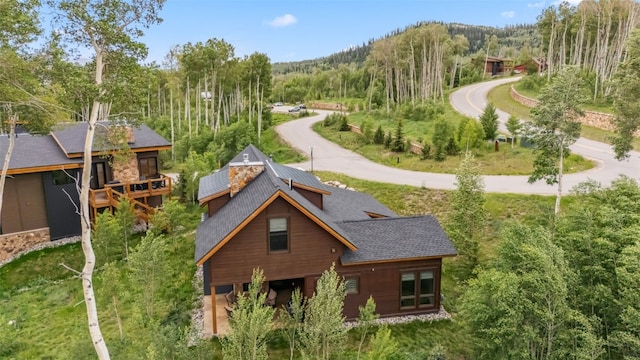 7 Moss Way, Silverthorne, CO 80498 - aerial view of property and surrounding area featuring a forest and a mountainous background