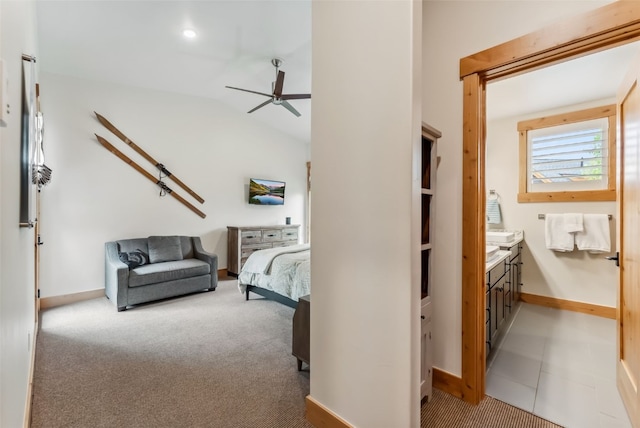 7 Moss Way, Silverthorne, CO 80498 - bedroom with vaulted ceiling, ensuite bathroom, and light colored carpet