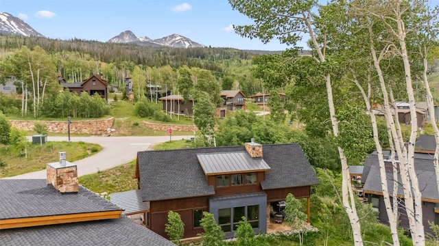 7 Moss Way, Silverthorne, CO 80498 - view of mountain backdrop featuring a heavily wooded area