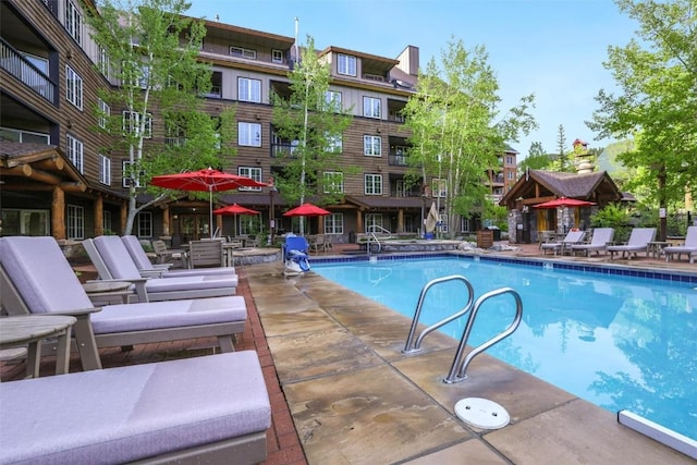 pool featuring a patio area