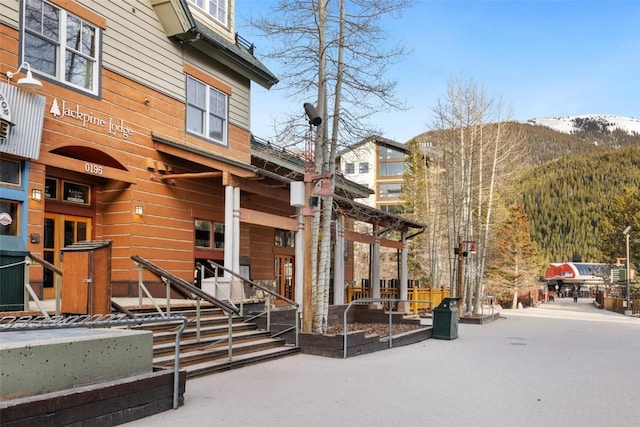 surrounding community with a mountain view