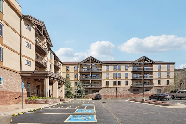 22787 US Highway 6 Unit 302, Keystone, CO 80435 - view of apartment building / complex with uncovered parking
