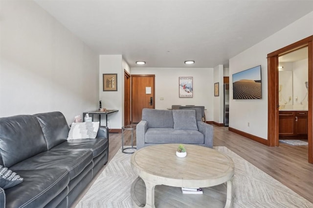 22787 US Highway 6 Unit 302, Keystone, CO 80435 - living room with baseboards and wood finished floors