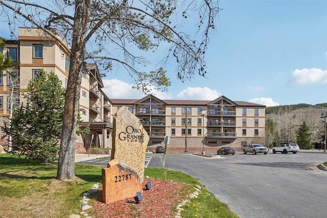 22787 US Highway 6 Unit 302, Keystone, CO 80435 - view of building exterior featuring uncovered parking