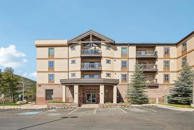 22787 US Highway 6 Unit 302, Keystone, CO 80435 - view of apartment building / complex with uncovered parking