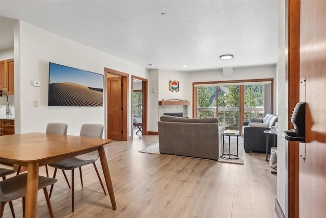 22787 US Highway 6 Unit 302, Keystone, CO 80435 - living room featuring light wood finished floors and recessed lighting