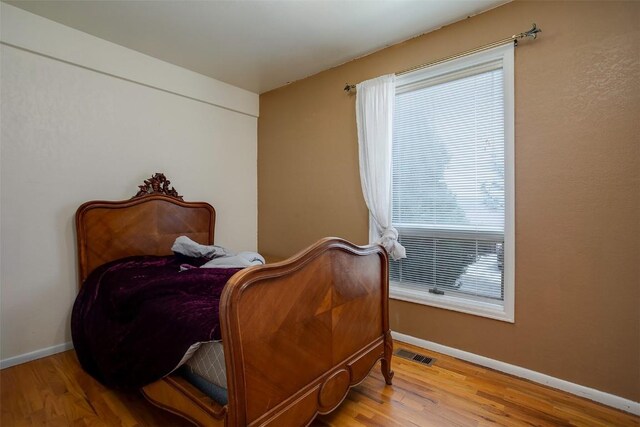 951 Alta Vista Dr, Craig, CO 81625 - bedroom featuring wood finished floors and baseboards