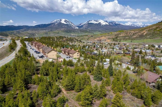 180 Evergreen Rd Unit 105, Dillon, CO 80435 - aerial view of property and surrounding area with a mountainous background and nearby suburban area