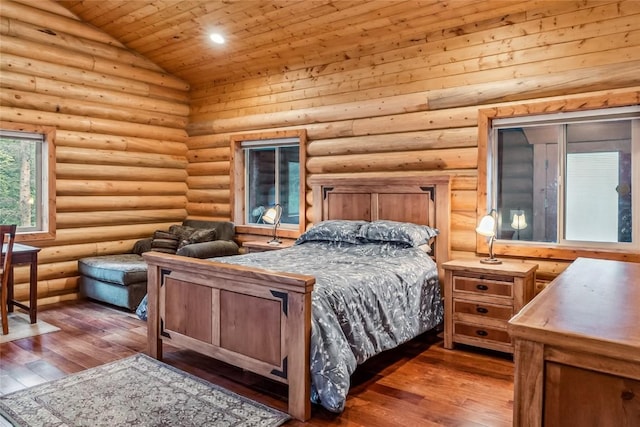 bedroom featuring lofted ceiling, wood-type flooring, wood ceiling, and log walls
