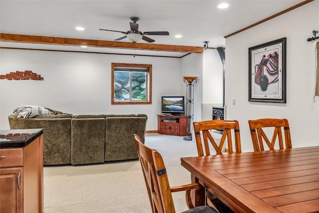 dining space featuring recessed lighting, ceiling fan, light carpet, and crown molding