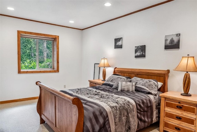 bedroom featuring baseboards, recessed lighting, light colored carpet, and crown molding