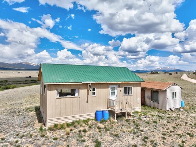 1091 Kokanee Rd, Fairplay, CO 80440 - rear view of property with a metal roof and a mountain view